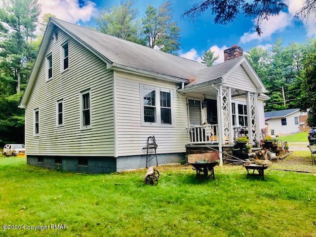 353 940th Route Pocono Lake, PA 18347 - Photo 3 of 29 other side view