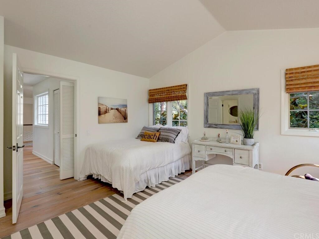 22 Chelsea Dana Point, CA 92629 - Photo 19 of 27 a bedroom with two beds and a dresser