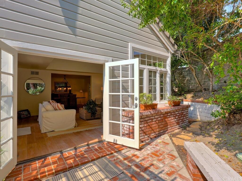 22 Chelsea Dana Point, CA 92629 - Photo 25 of 27 a front view of a house with a porch