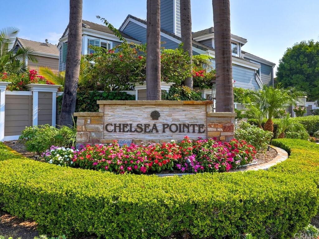 22 Chelsea Dana Point, CA 92629 - Photo 26 of 27 a view of a house with a big yard and potted plants