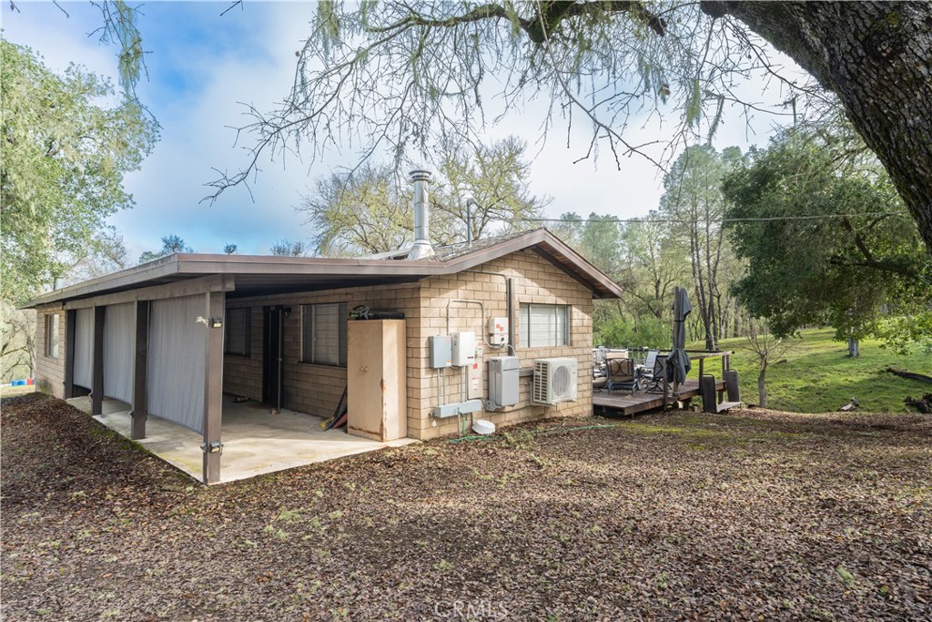 4500 Gage Irving Road Paso Robles, CA 93446 - Photo 1 of 16 a view of a house with a yard and large tree