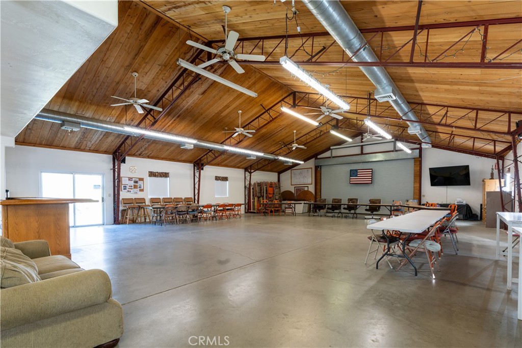 4500 Gage Irving Road Paso Robles, CA 93446 - Photo 16 of 16 a view of a patio with table and chairs with wooden floor