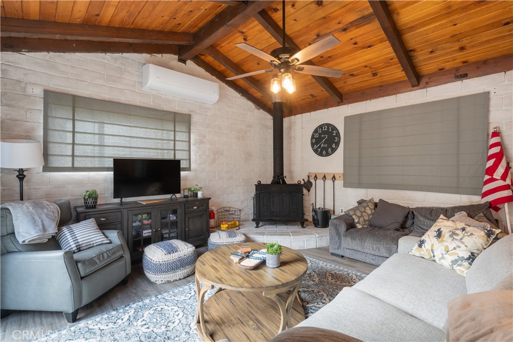 4500 Gage Irving Road Paso Robles, CA 93446 - Photo 6 of 16 a living room with furniture and a flat screen tv