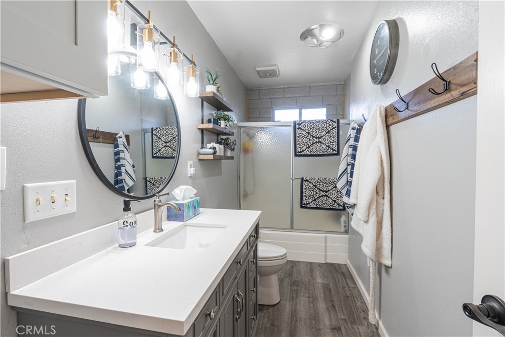 4500 Gage Irving Road Paso Robles, CA 93446 - Photo 9 of 16 a bathroom with a sink mirror and vanity