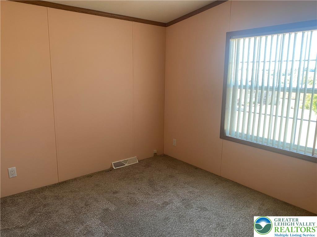 82 Pheasant Drive Kutztown, PA 19530 - Photo 22 of 32 an empty room with a window