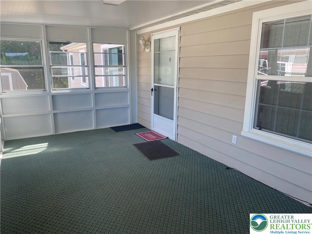 82 Pheasant Drive Kutztown, PA 19530 - Photo 5 of 32 a view of empty room with windows