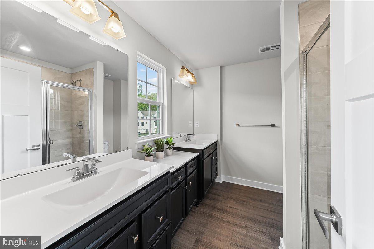 2145 Rivers Drive Newark, DE 19702 - Photo 14 of 30 Modern elegance in a bright bathroom.