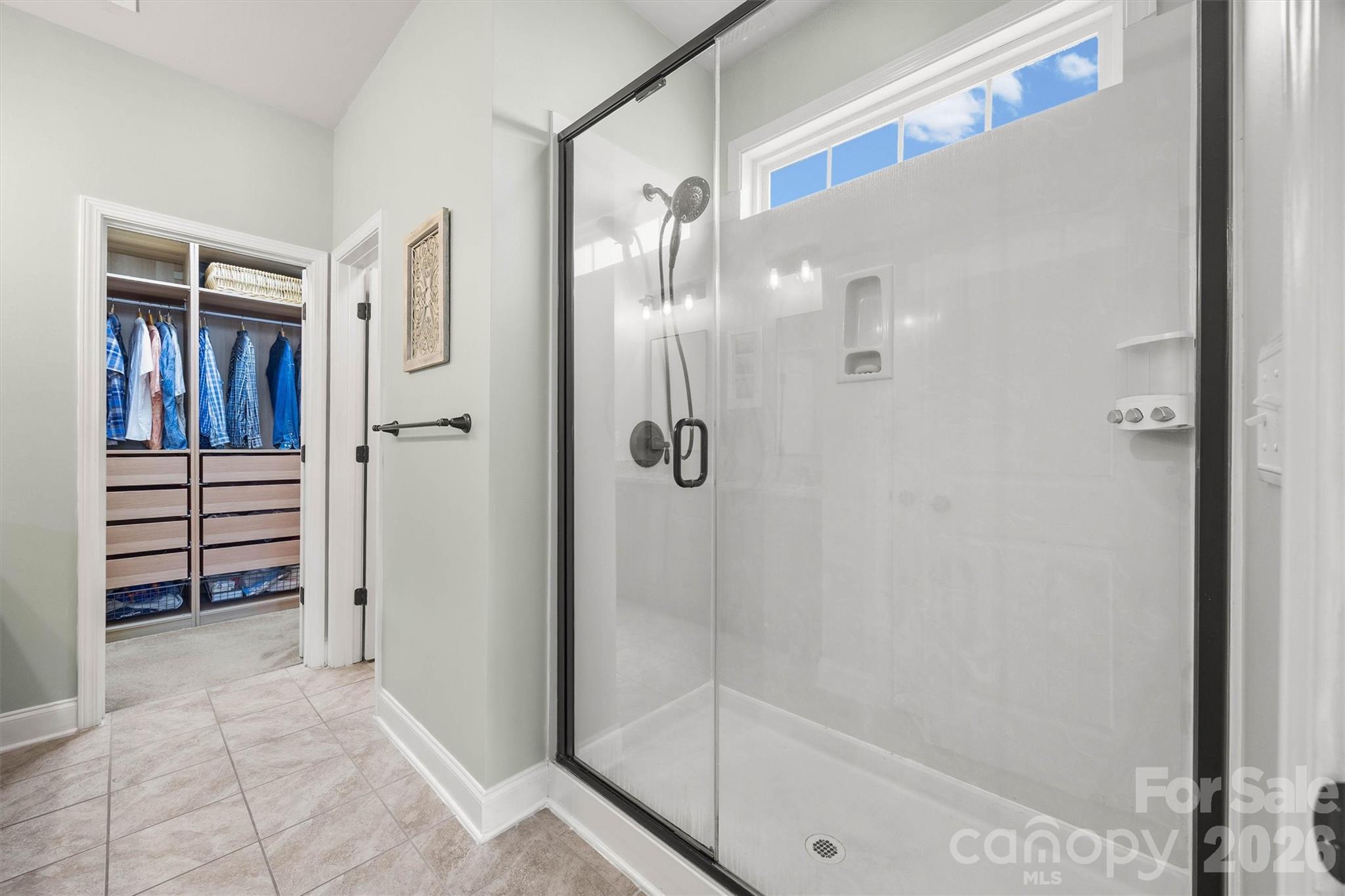 299 Annatto Way Tega Cay, SC 29708 - Photo 25 of 46 a bathroom with a shower