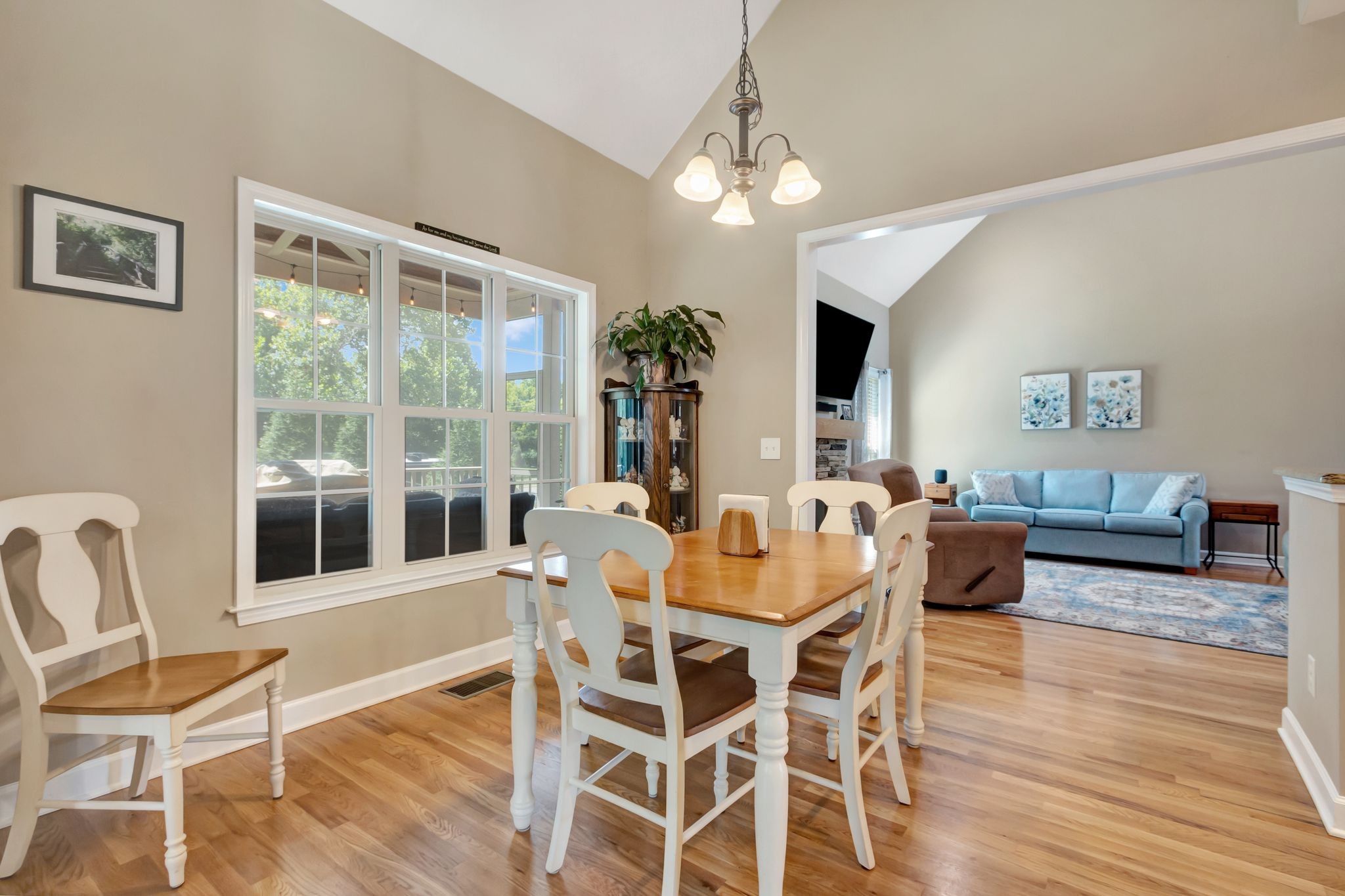 1004 Rudder Drive Spring Hill, TN 37174 - Photo 12 of 50 a view of a dining room with furniture wooden floor and chandelier