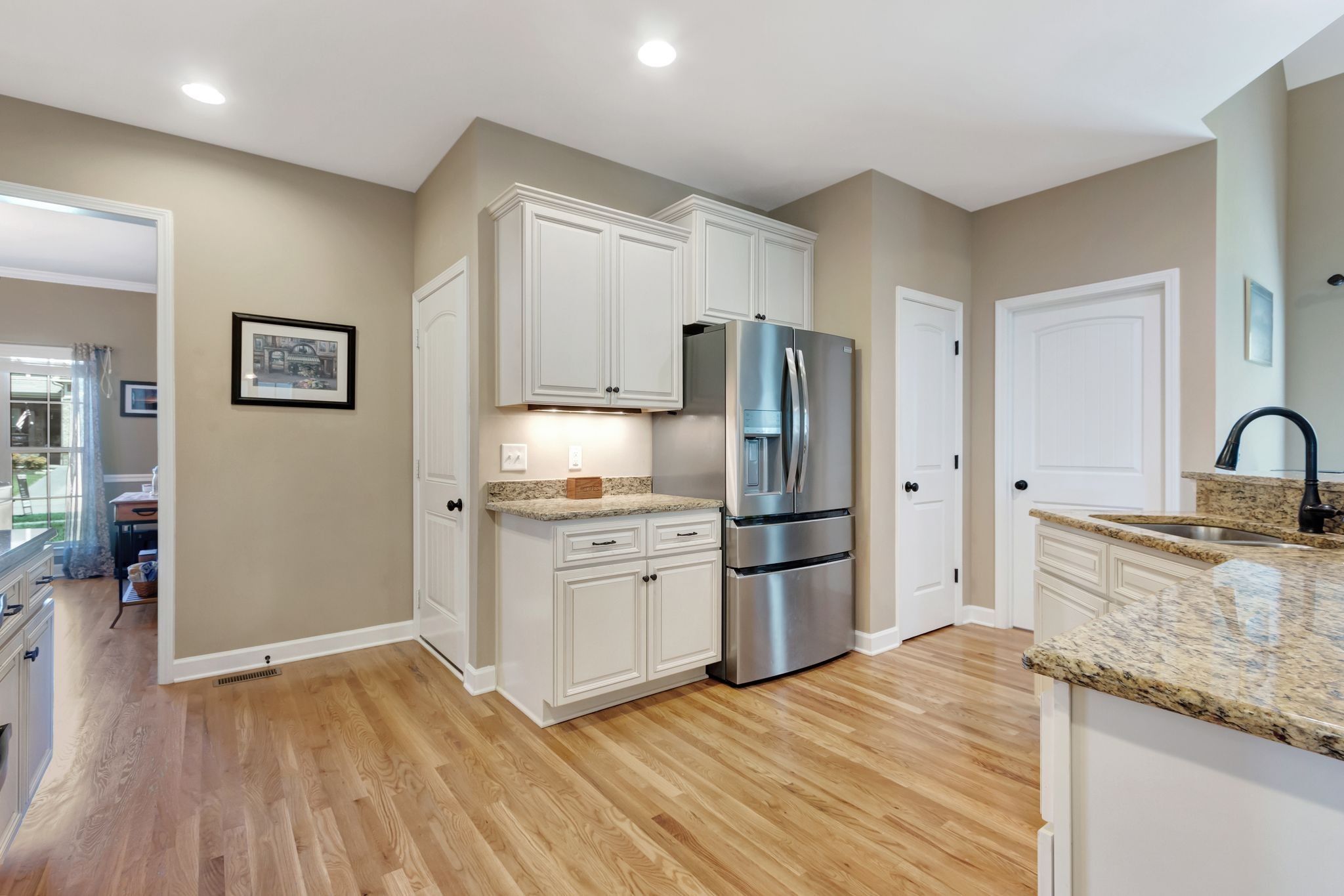 1004 Rudder Drive Spring Hill, TN 37174 - Photo 16 of 50 a kitchen with a refrigerator and a sink