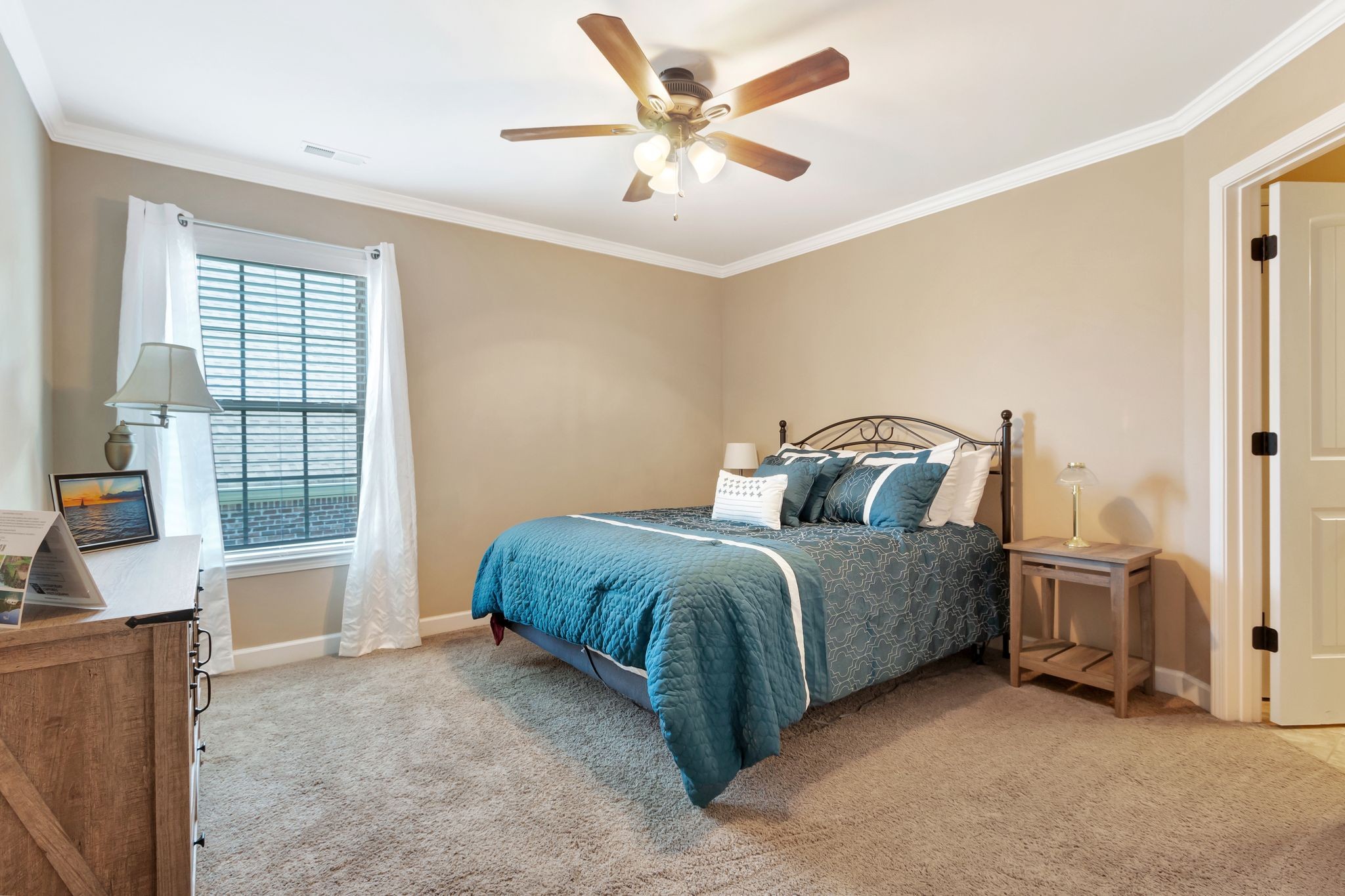 1004 Rudder Drive Spring Hill, TN 37174 - Photo 34 of 50 a spacious bedroom with a bed dresser and a window