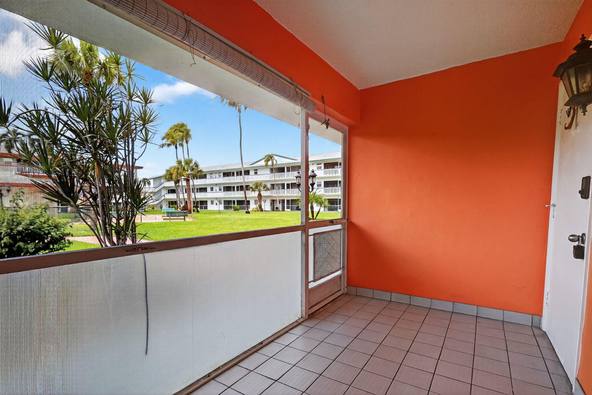 5300 Washington Street, Unit J116 Hollywood, FL 33021 - Photo 12 of 36 a view of a two chairs in the patio