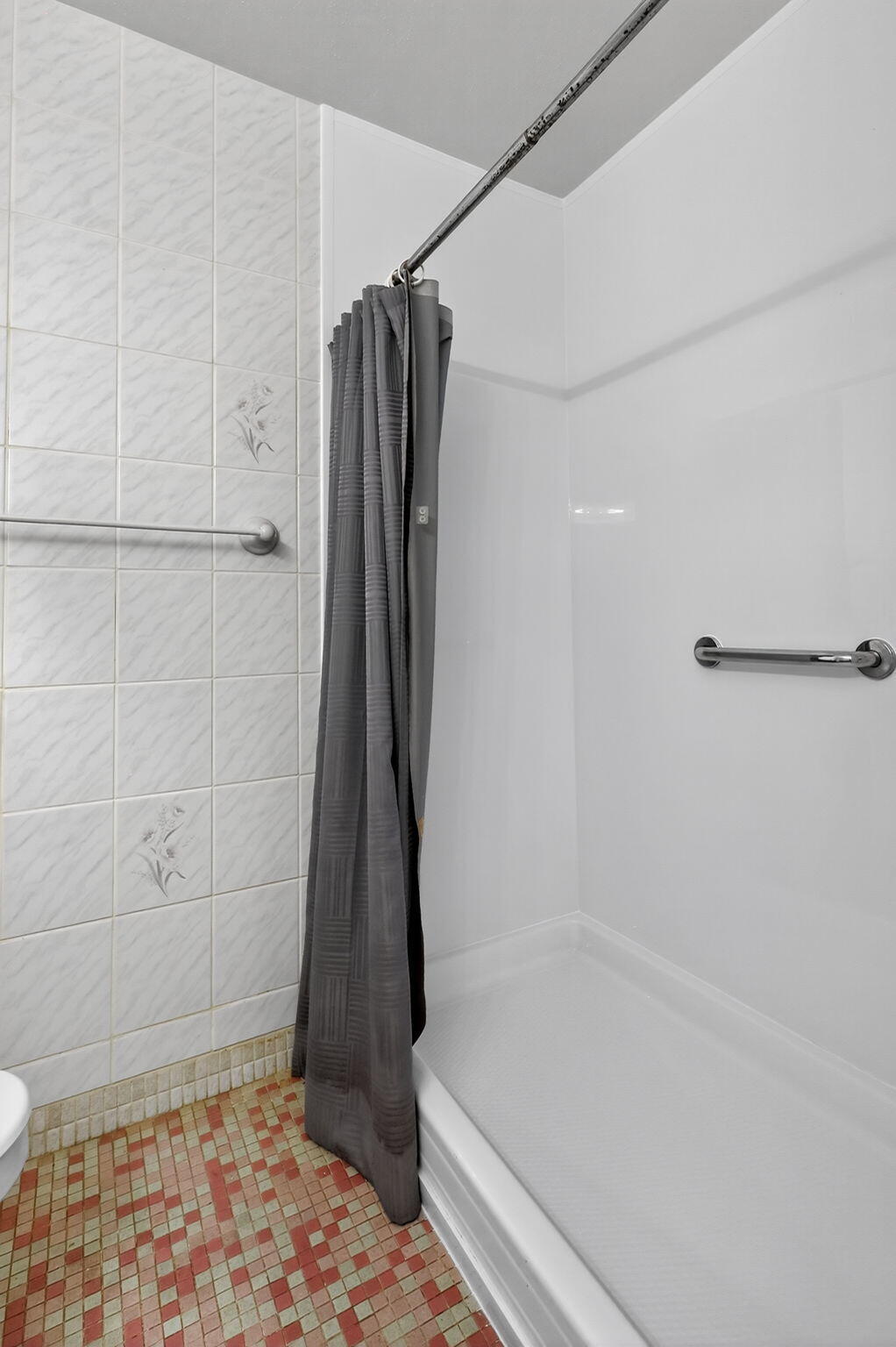 5300 Washington Street, Unit J116 Hollywood, FL 33021 - Photo 24 of 36 a bathroom with a shower and a toilet
