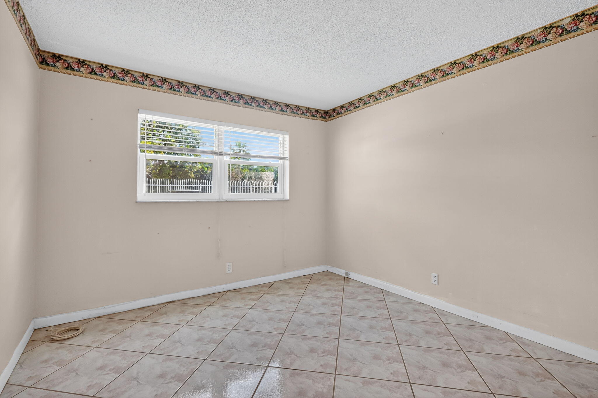 5300 Washington Street, Unit J116 Hollywood, FL 33021 - Photo 26 of 36 a view of an empty room with a window