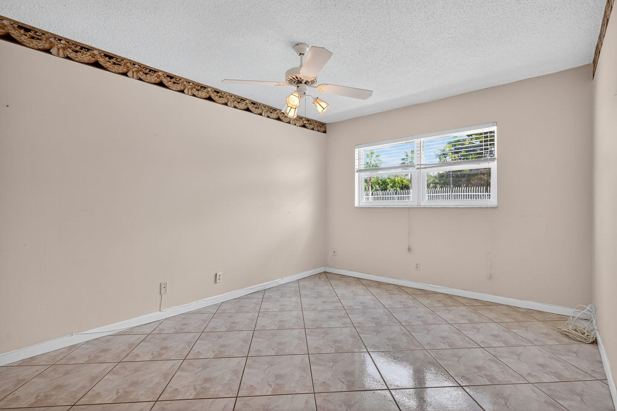 5300 Washington Street, Unit J116 Hollywood, FL 33021 - Photo 28 of 36 a view of an empty room with a window