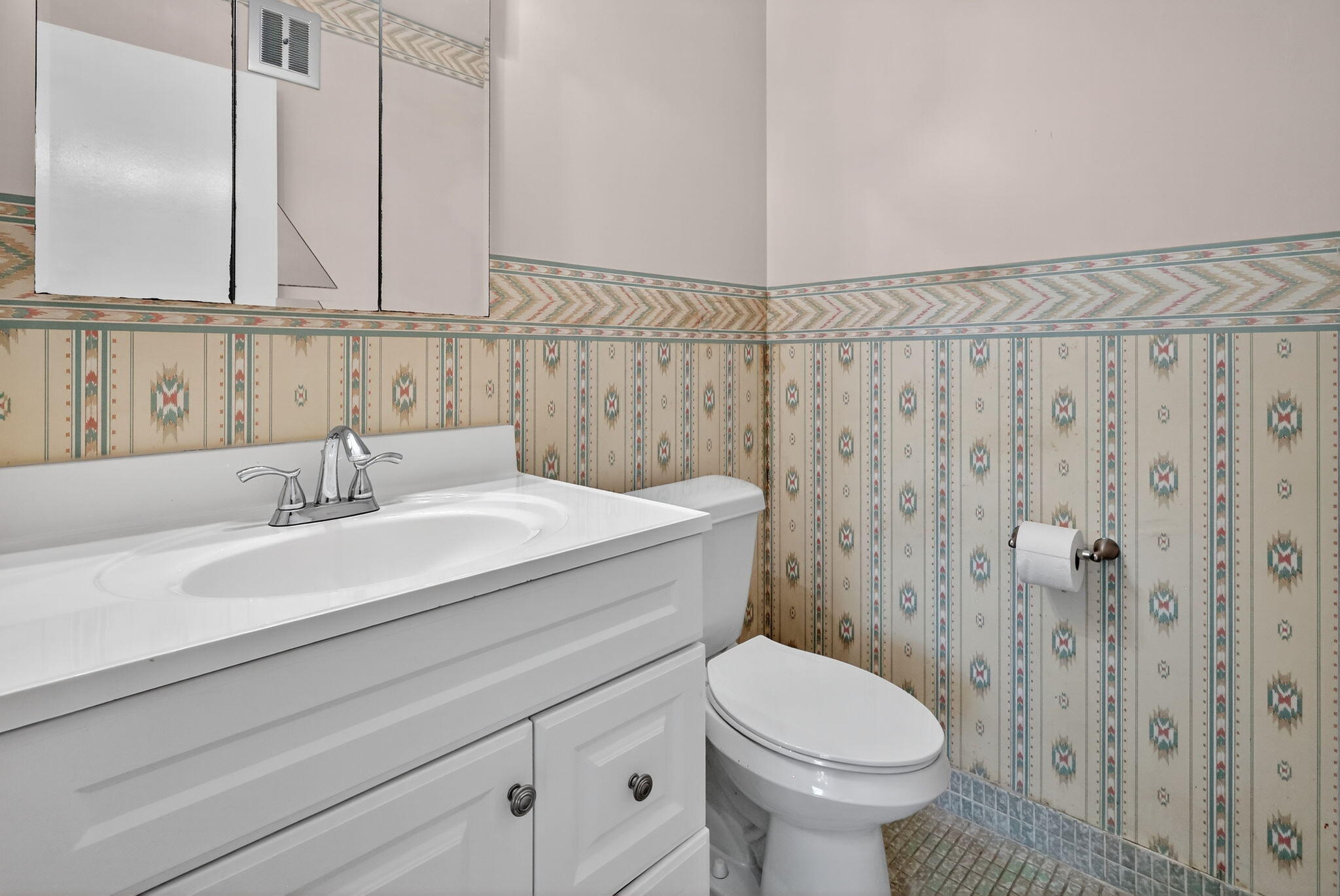 5300 Washington Street, Unit J116 Hollywood, FL 33021 - Photo 30 of 36 a bathroom with a sink a toilet and a mirror