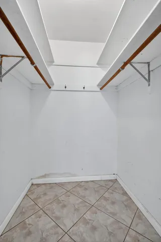 a view of a room with racks on the wall