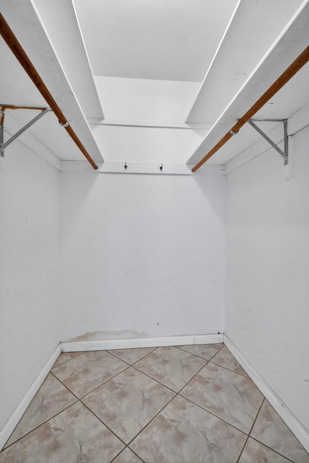 5300 Washington Street, Unit J116 Hollywood, FL 33021 - Photo 32 of 36 a view of a room with racks on the wall