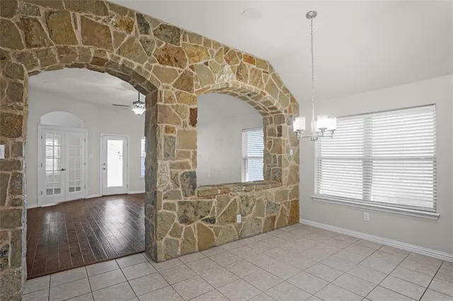 a view of an entryway with a door