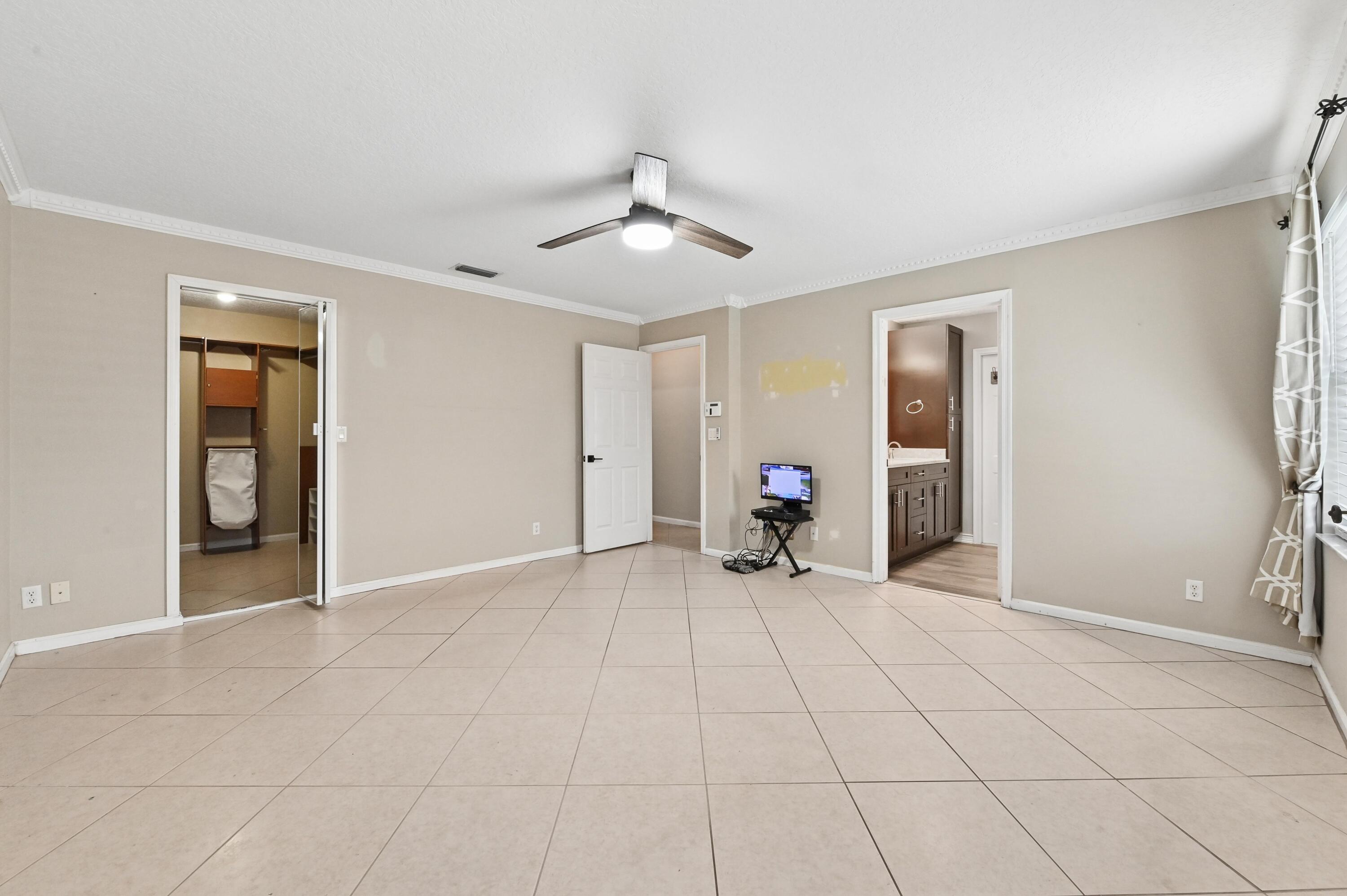1163 Peninsula Way Greenacres, FL 33413 - Photo 12 of 40 25 Bedroom 06