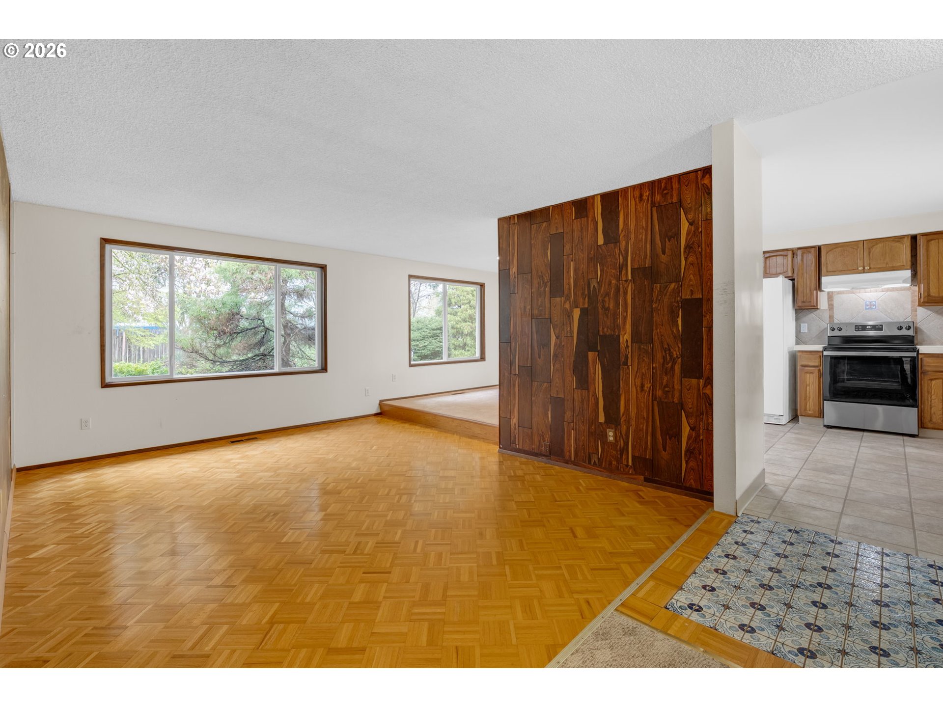211 Southwest Royal Court Gresham, OR 97030 - Photo 16 of 37 a view of an empty room with a window