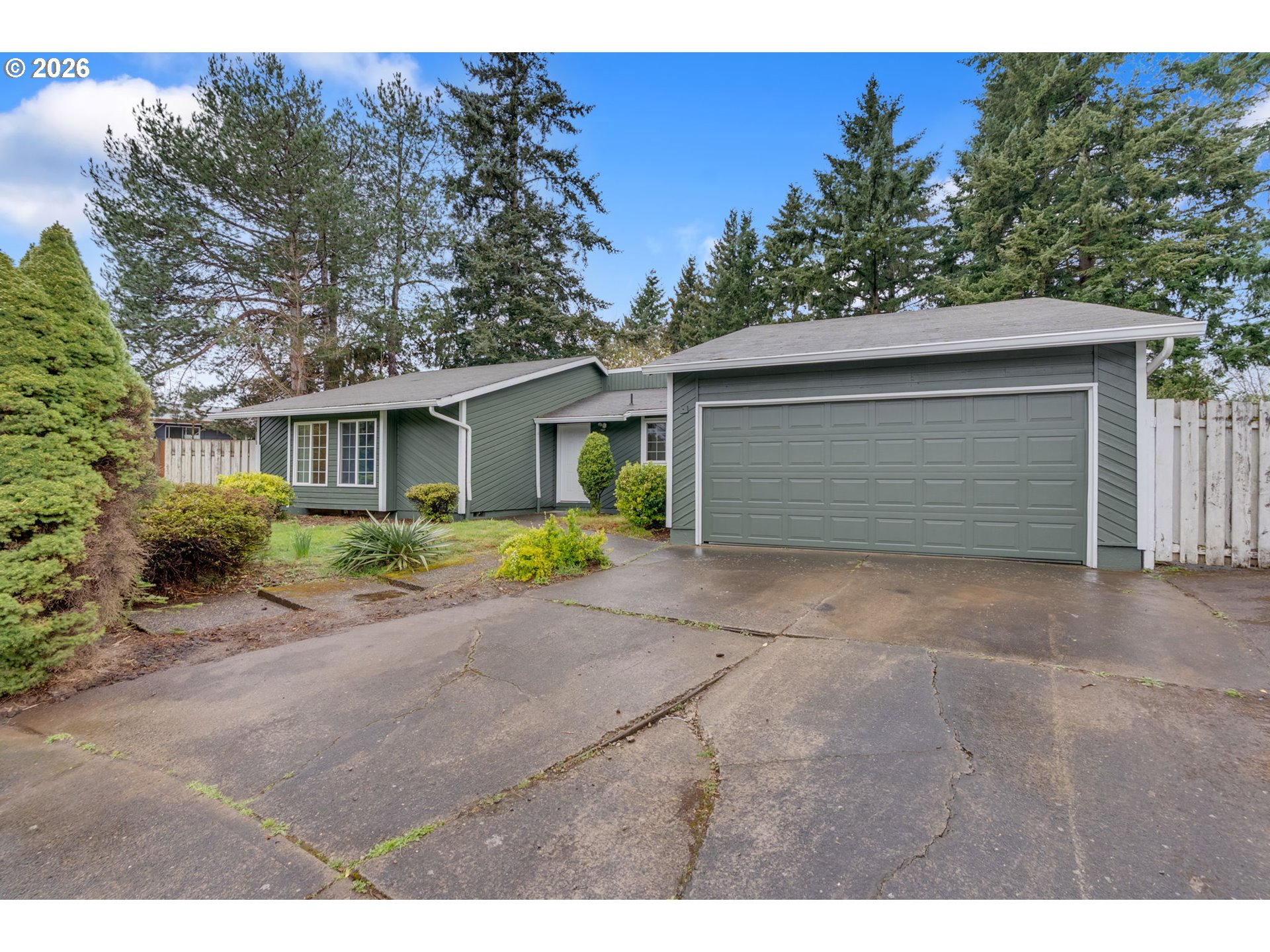 211 Southwest Royal Court Gresham, OR 97030 - Photo 2 of 37 a view of a house with a yard and garage