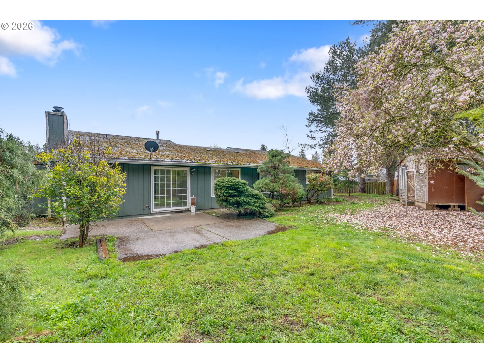 211 Southwest Royal Court Gresham, OR 97030 - Photo 36 of 37 a view of a house with backyard and a tree