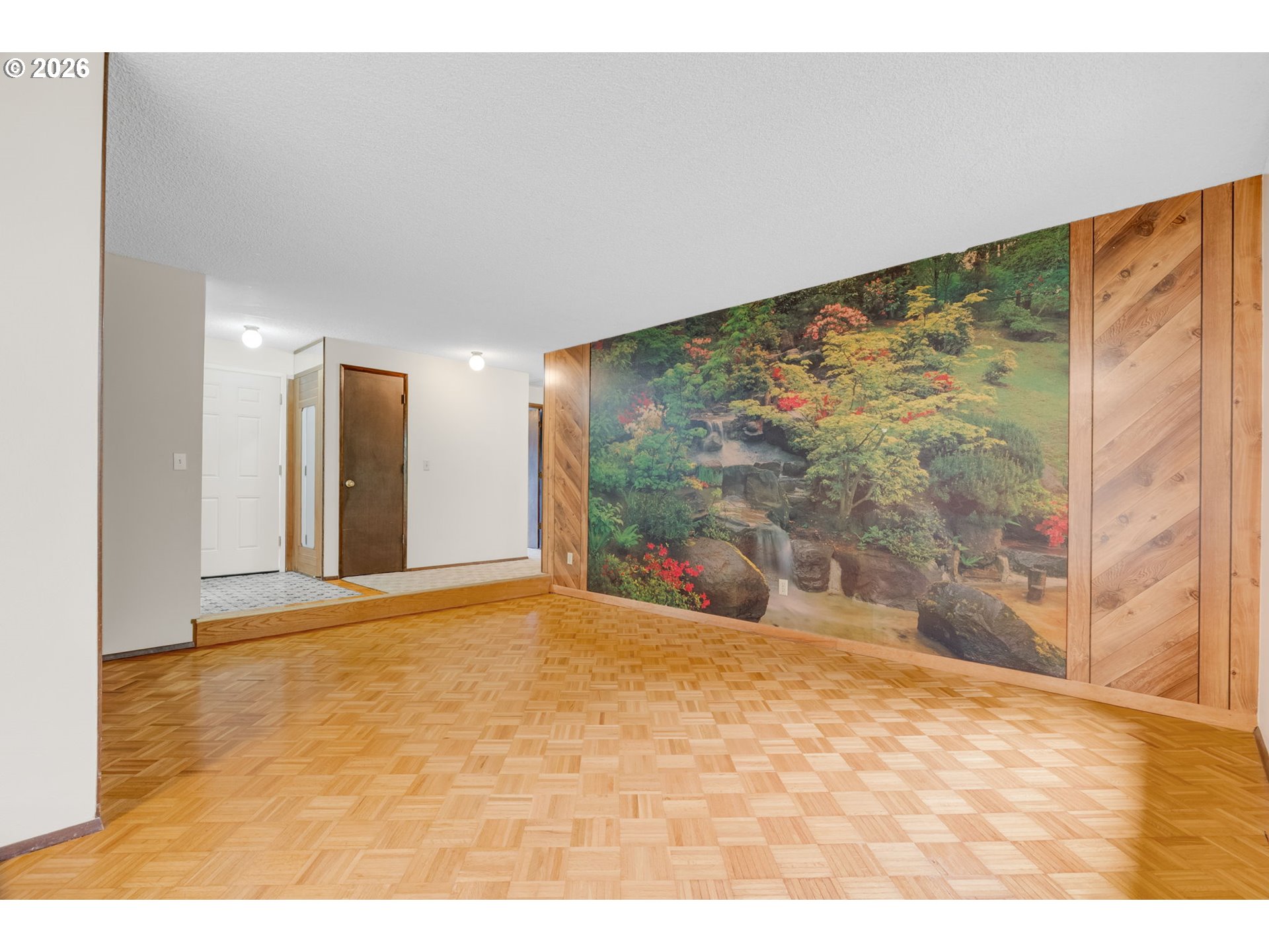211 Southwest Royal Court Gresham, OR 97030 - Photo 7 of 37 a view of empty room with wooden floor and fan