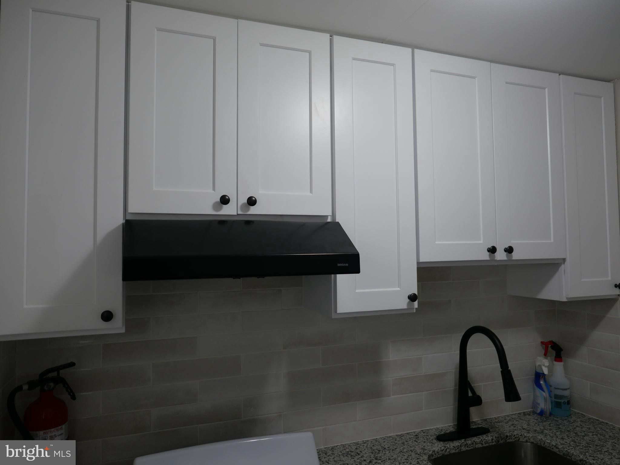 313 Hampden Road Upper Darby, PA 19082 - Photo 7 of 12 a view of cabinets and window