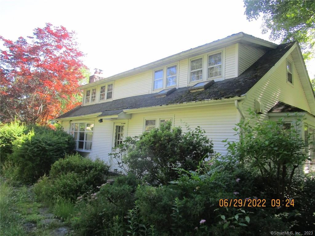 5 Evans Hill Road Sherman, CT 06784 - Photo 1 of 1 a view of a house with pool plants and large trees