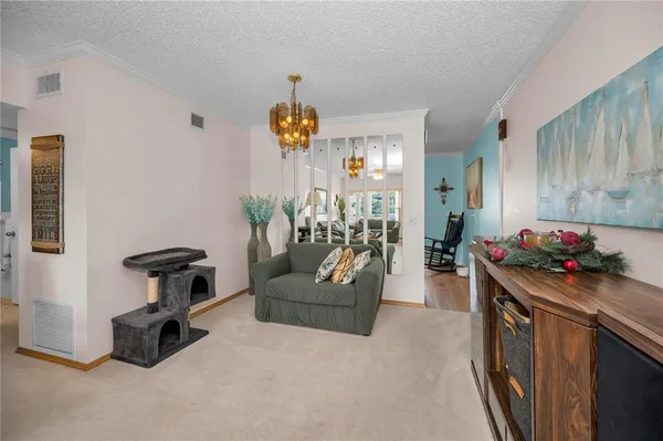 a living room with furniture and a couch