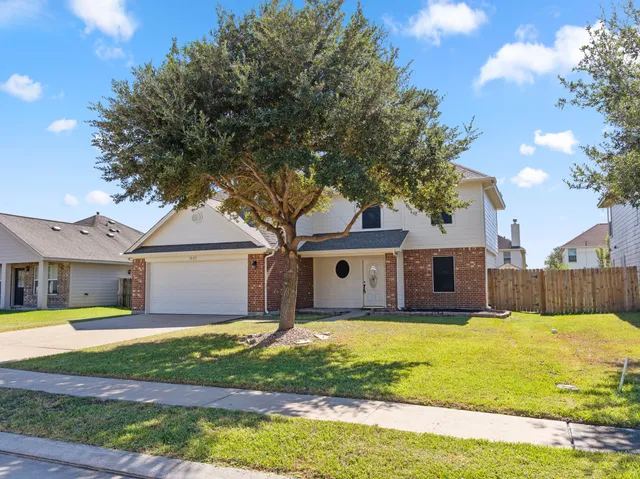 a view of house with a swimming pool