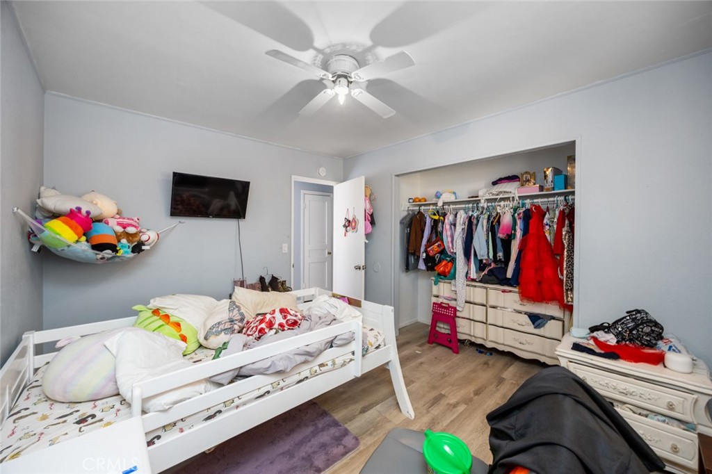 18629 Orange Street Hesperia, CA 92345 - Photo 26 of 46 a bedroom with toys and a couch