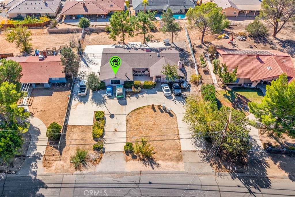 18629 Orange Street Hesperia, CA 92345 - Photo 38 of 46 an aerial view of residential house with outdoor space and swimming pool