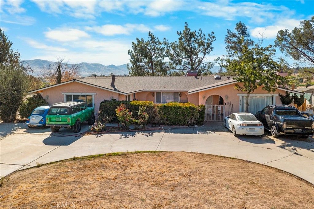 18629 Orange Street Hesperia, CA 92345 - Photo 4 of 46 a view of a house with a patio