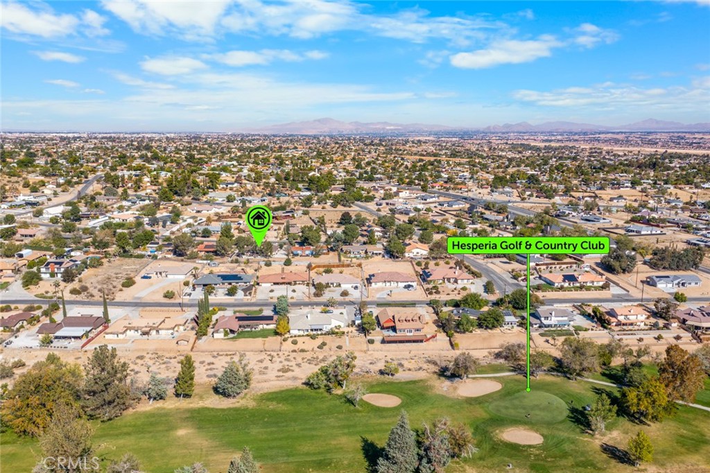 18629 Orange Street Hesperia, CA 92345 - Photo 45 of 46 an aerial view of residential houses with outdoor space