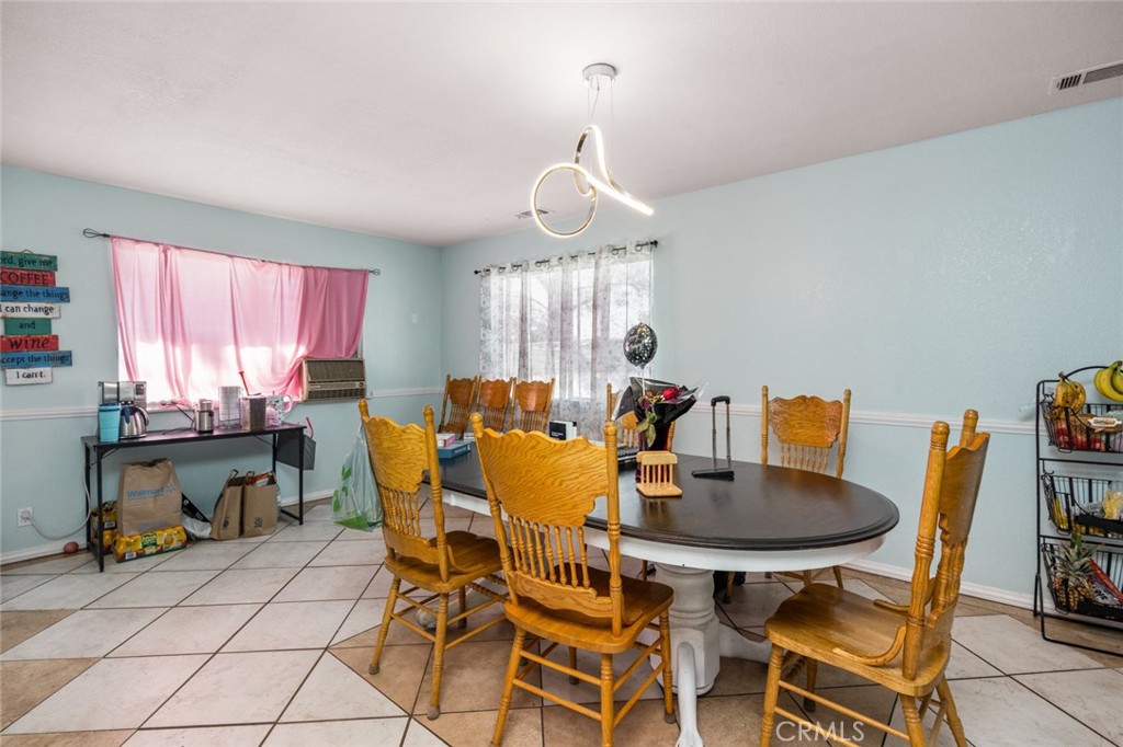 18629 Orange Street Hesperia, CA 92345 - Photo 9 of 46 a view of a dining room with furniture