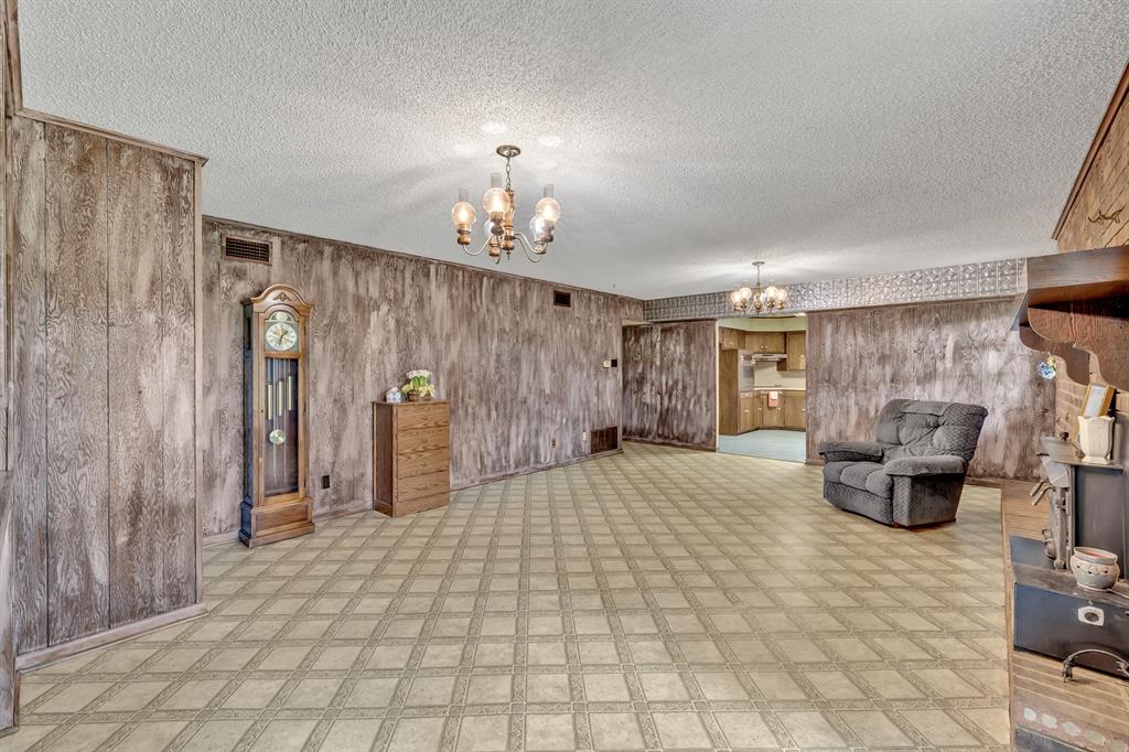 1368 County Road 2206 Rusk, TX 75785 - Photo 14 of 32 a view of empty room with wooden floor and fan
