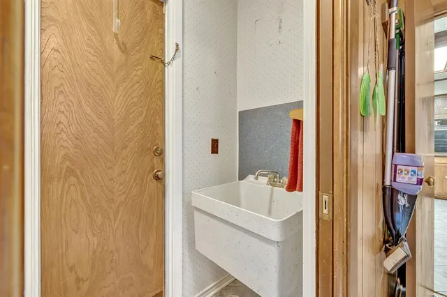 a view of bathroom with a mirror