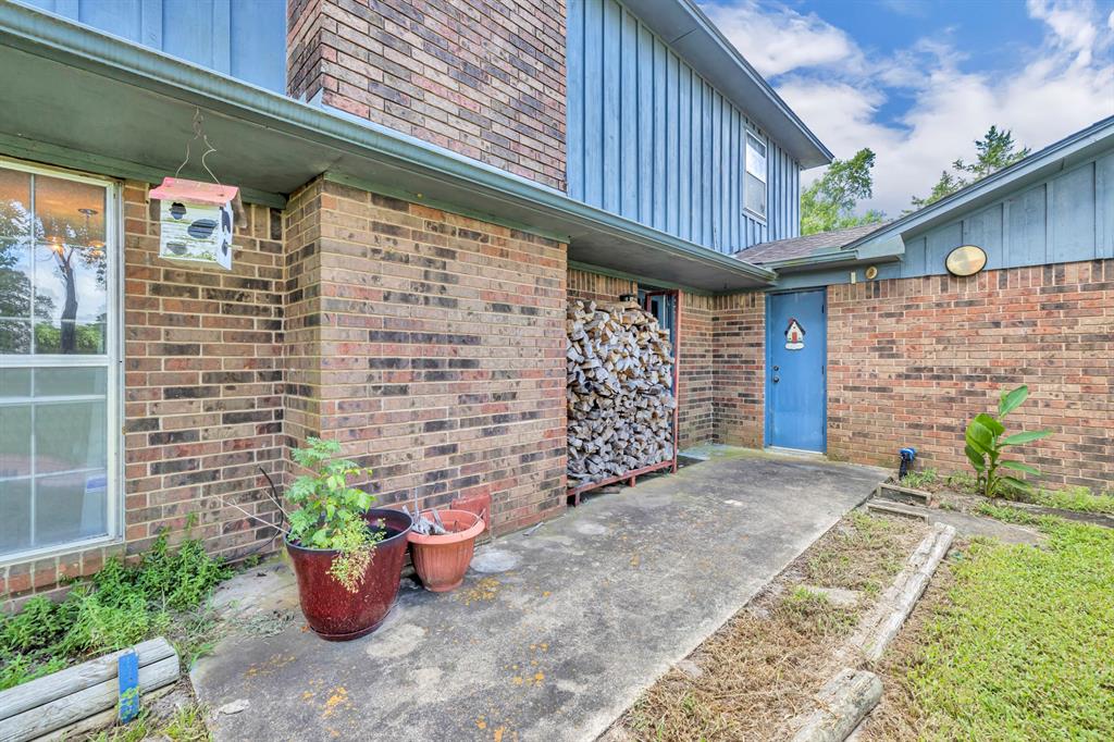 1368 County Road 2206 Rusk, TX 75785 - Photo 23 of 32 a view of a patio with potted plants