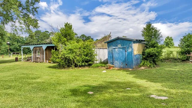 a backyard of a house with garden
