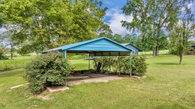 a view of outdoor space and yard