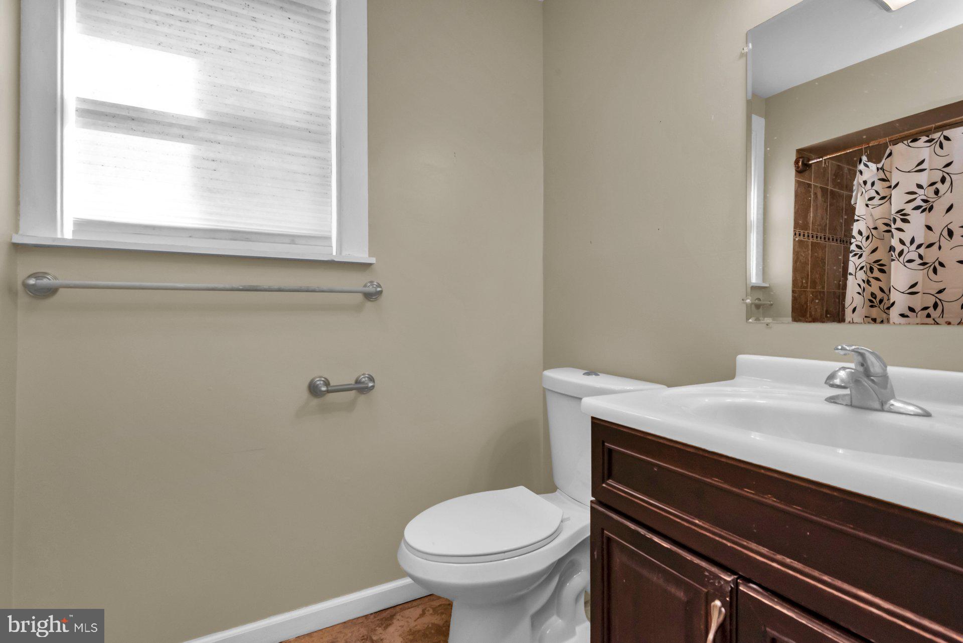 5701 Old Court Road Baltimore, MD 21244 - Photo 22 of 52 Main Level Bathroom with Window