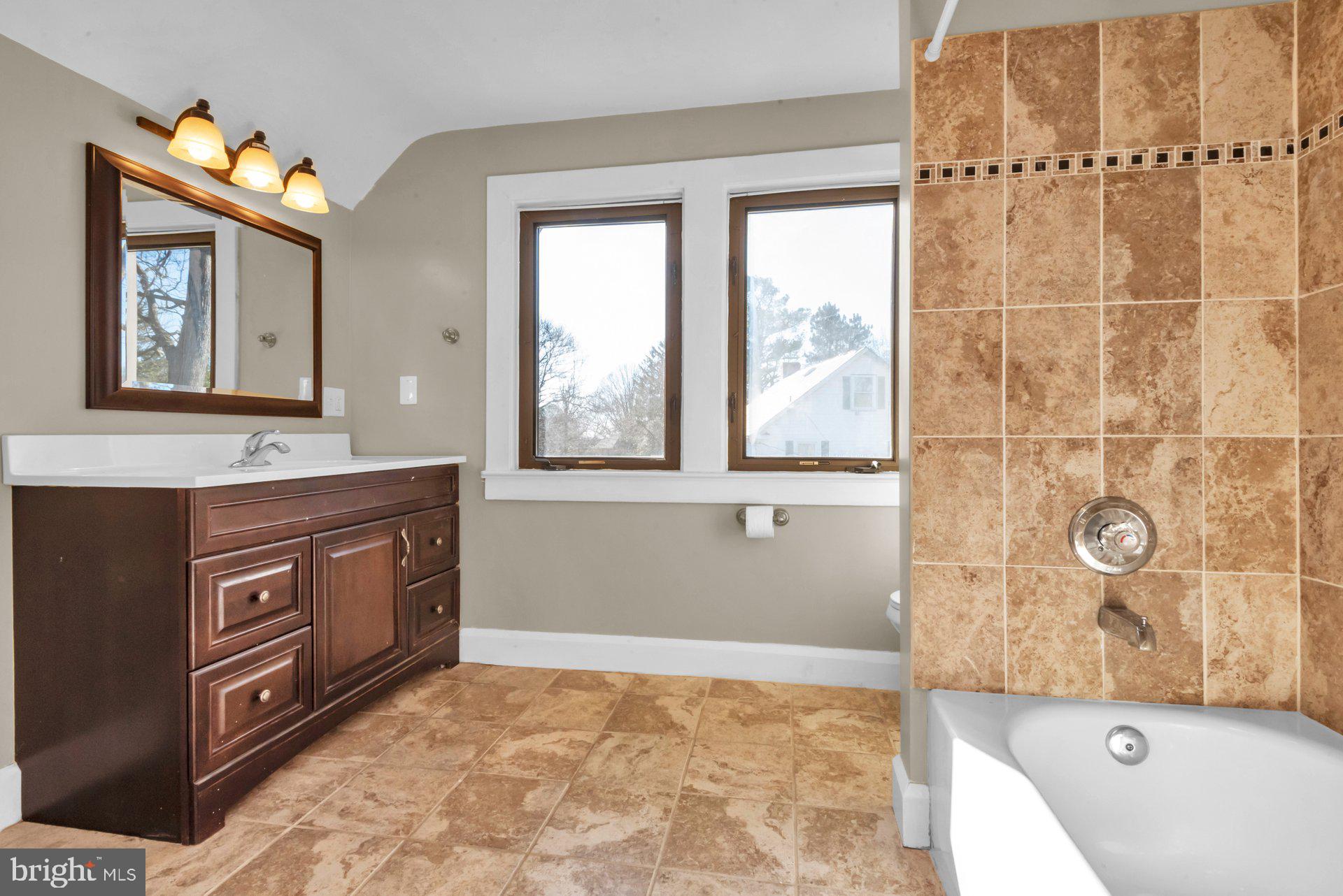 5701 Old Court Road Baltimore, MD 21244 - Photo 29 of 52 Upper Level Full Bath with Tile Surround