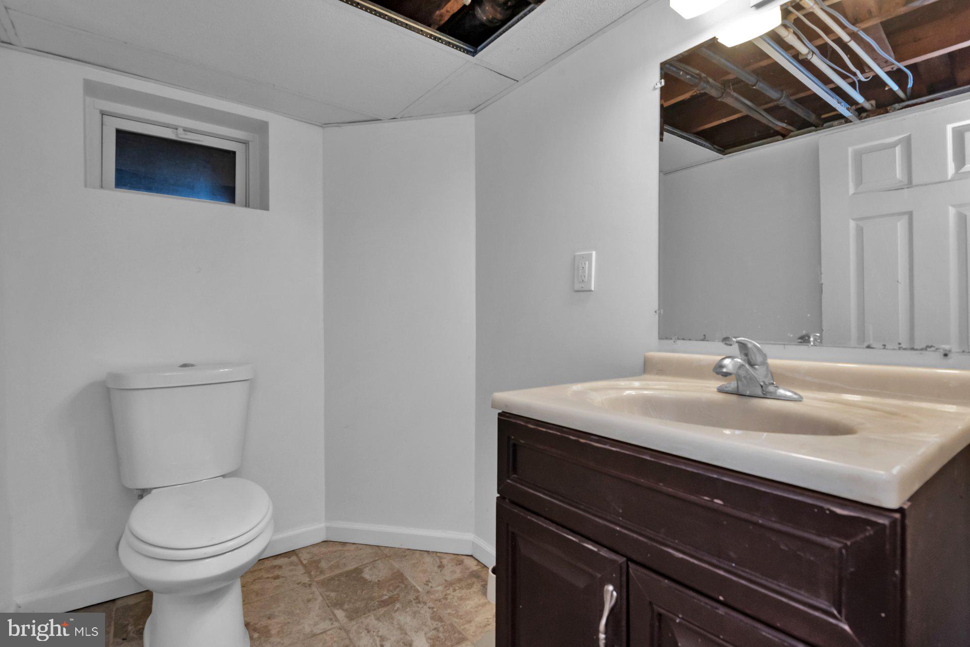 5701 Old Court Road Baltimore, MD 21244 - Photo 37 of 52 Lower Level Half Bath with Vanity