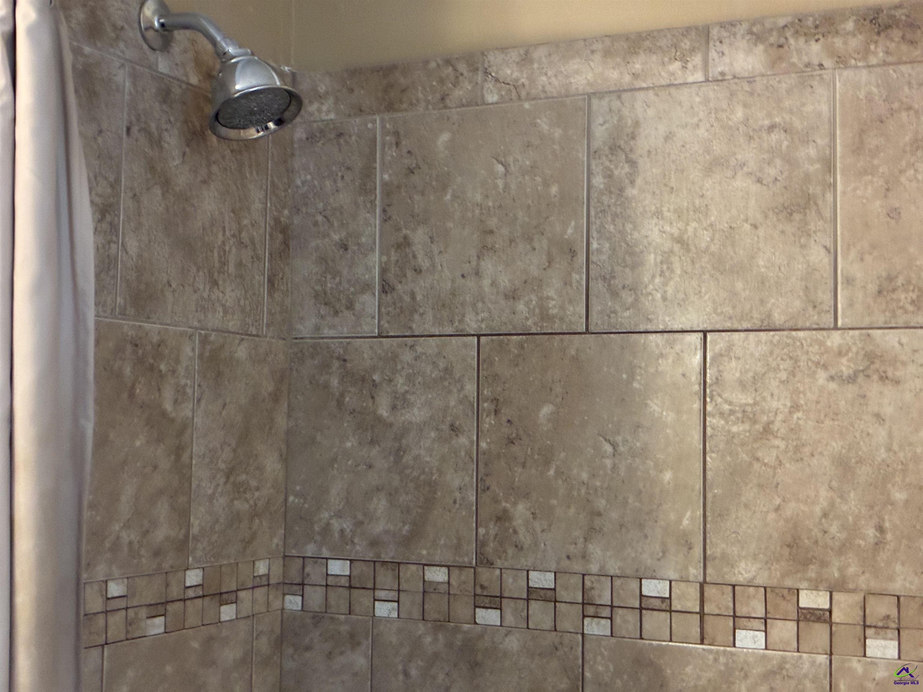 3491 Sandy Circle Macon, GA 31216 - Photo 28 of 47 a bathroom with a shower