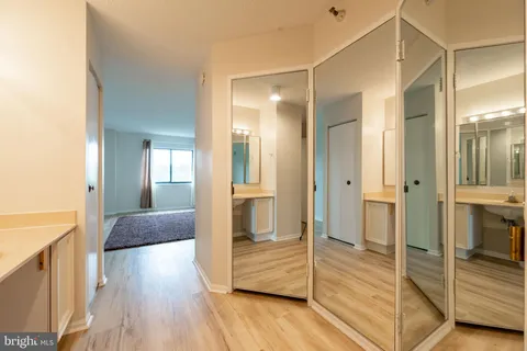 a view of a bathroom with tub and shower