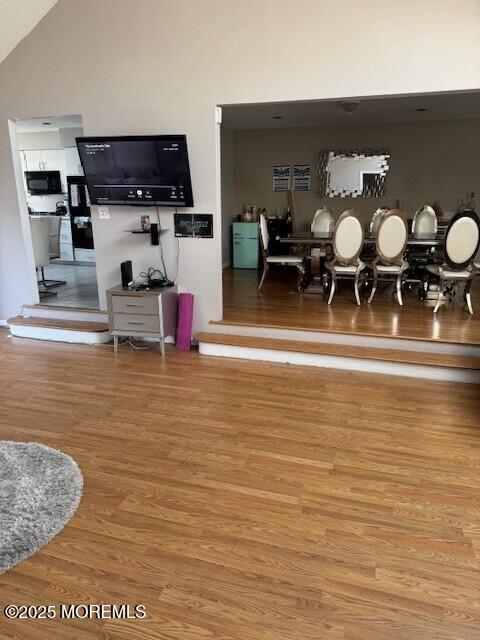 406 Deal Road Asbury Park, NJ 07712 - Photo 2 of 6 a living room with furniture and a flat screen tv