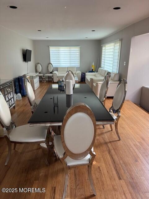 406 Deal Road Asbury Park, NJ 07712 - Photo 5 of 6 a living room with furniture a window and a wooden floor