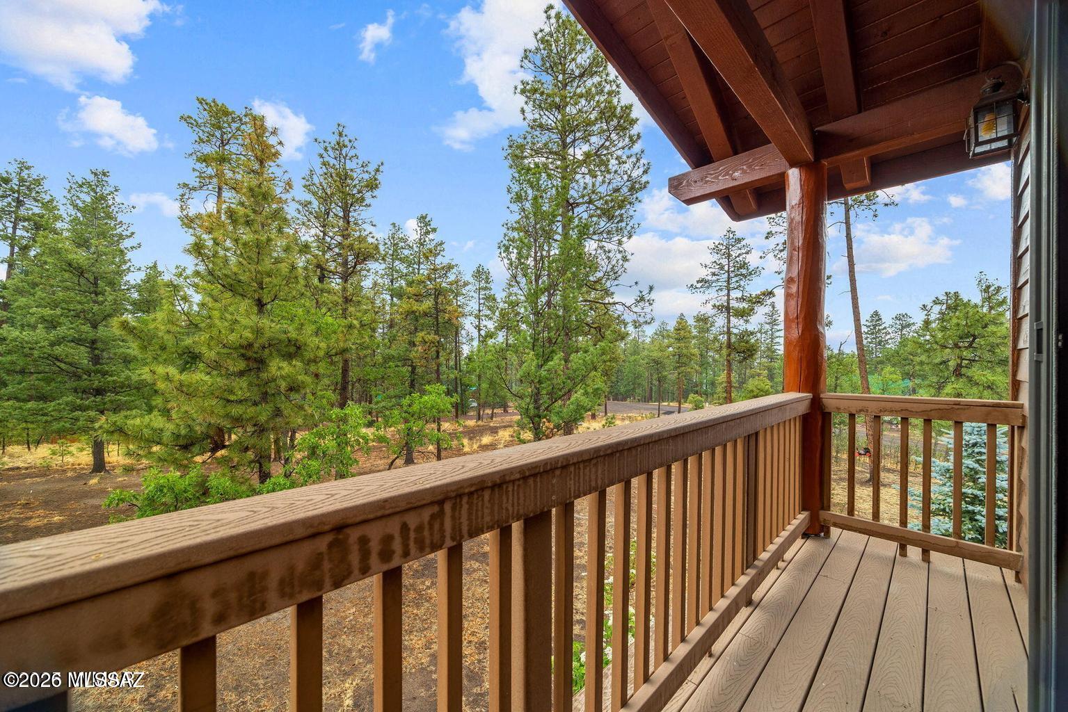 17 2195 Alpine, AZ 85920 - Photo 31 of 48 a view of a balcony with wooden floor